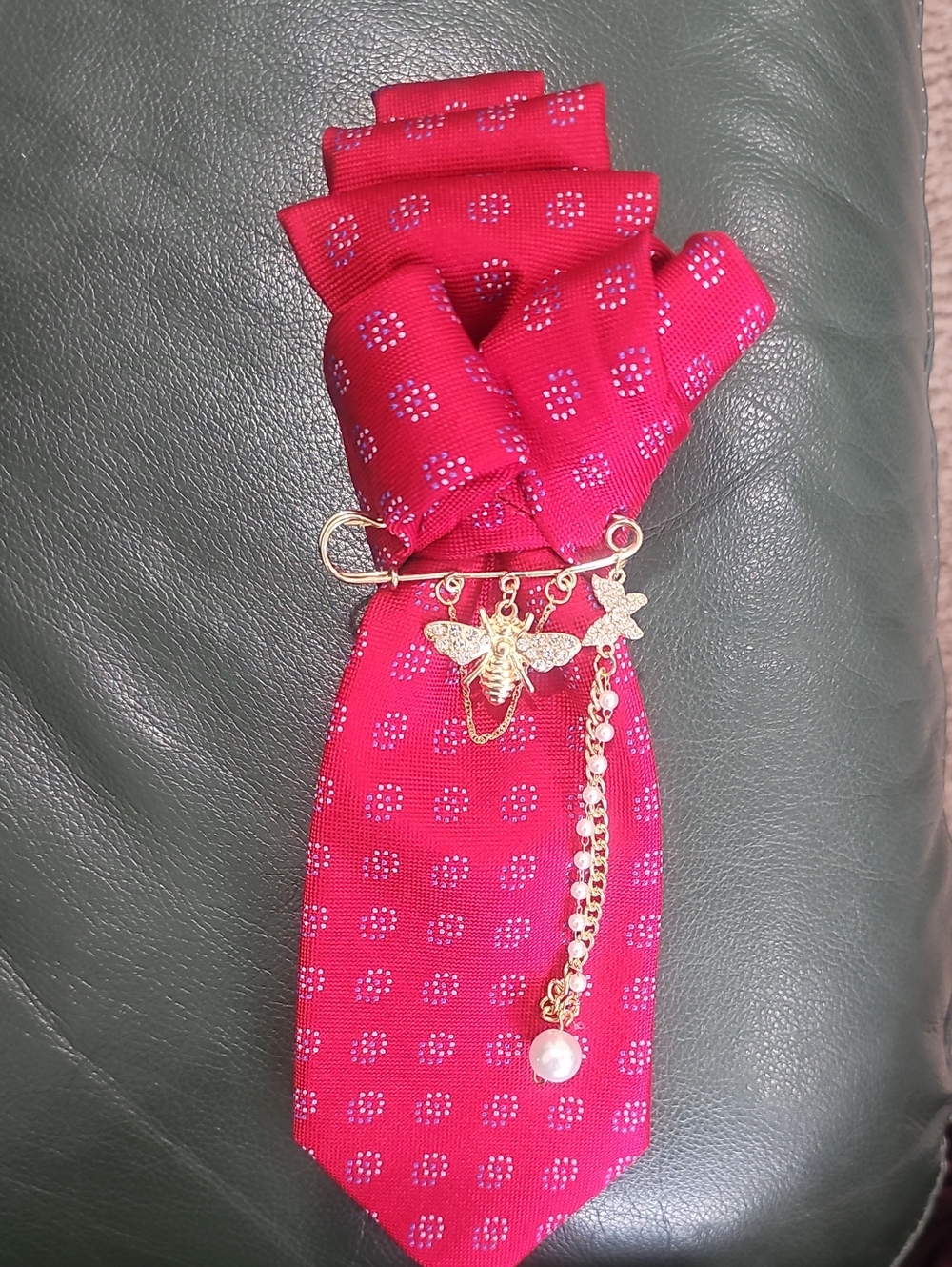 Gold Bee & Pearl Charm Pin on Red Tie
